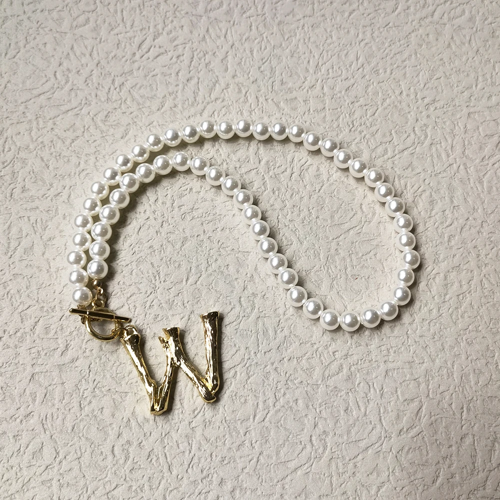 

Lost Lady Fashion ING Creative Letter Necklace Popular Temperament Lady Pearl Necklace Alloy Pendant Jewelry Wholesale Direct