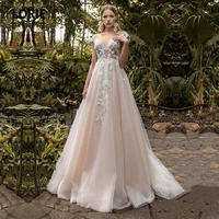 lorie blush pink wedding dresses romantic nude neckline lace pearls cap sleeves wedding gown bridal dress vestidos de verano