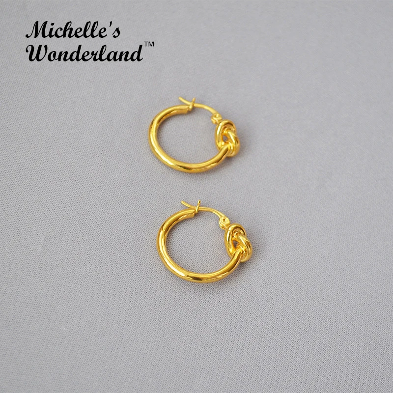 Серьги кольца с узлом золотого/серебряного цвета минимализм Высокое качество