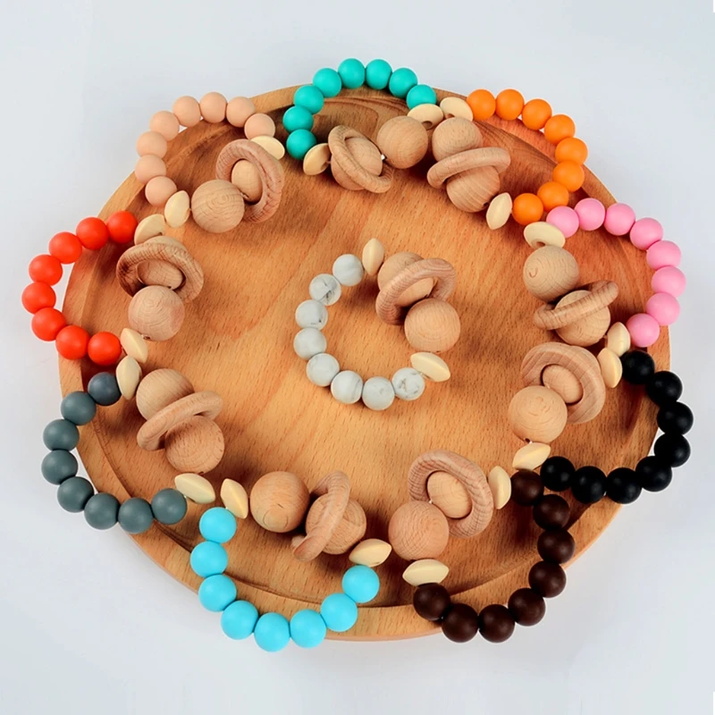 

Silicone Bracelet Wooden Baby Teething Toy Teether Nursing Bracelet Silicone Teething Beads Organic Kids Molar Bracelet