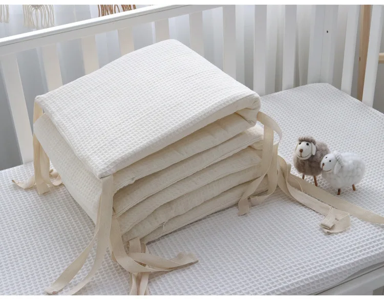 

Crib bed surrounded by a piece of waffle gauze cotton removable and washable newborn baby anti-collision bedding kit 2021
