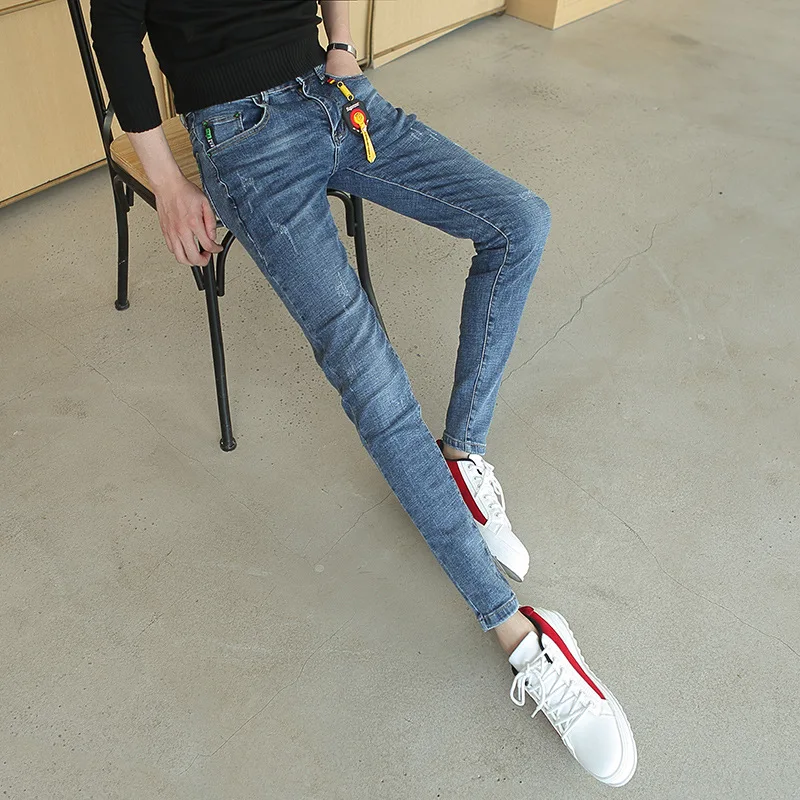 

Autumn winter 2021 new simple trousers denim jeans men's Korean trendy elastic feet autumn boys slim teenager pencil pants