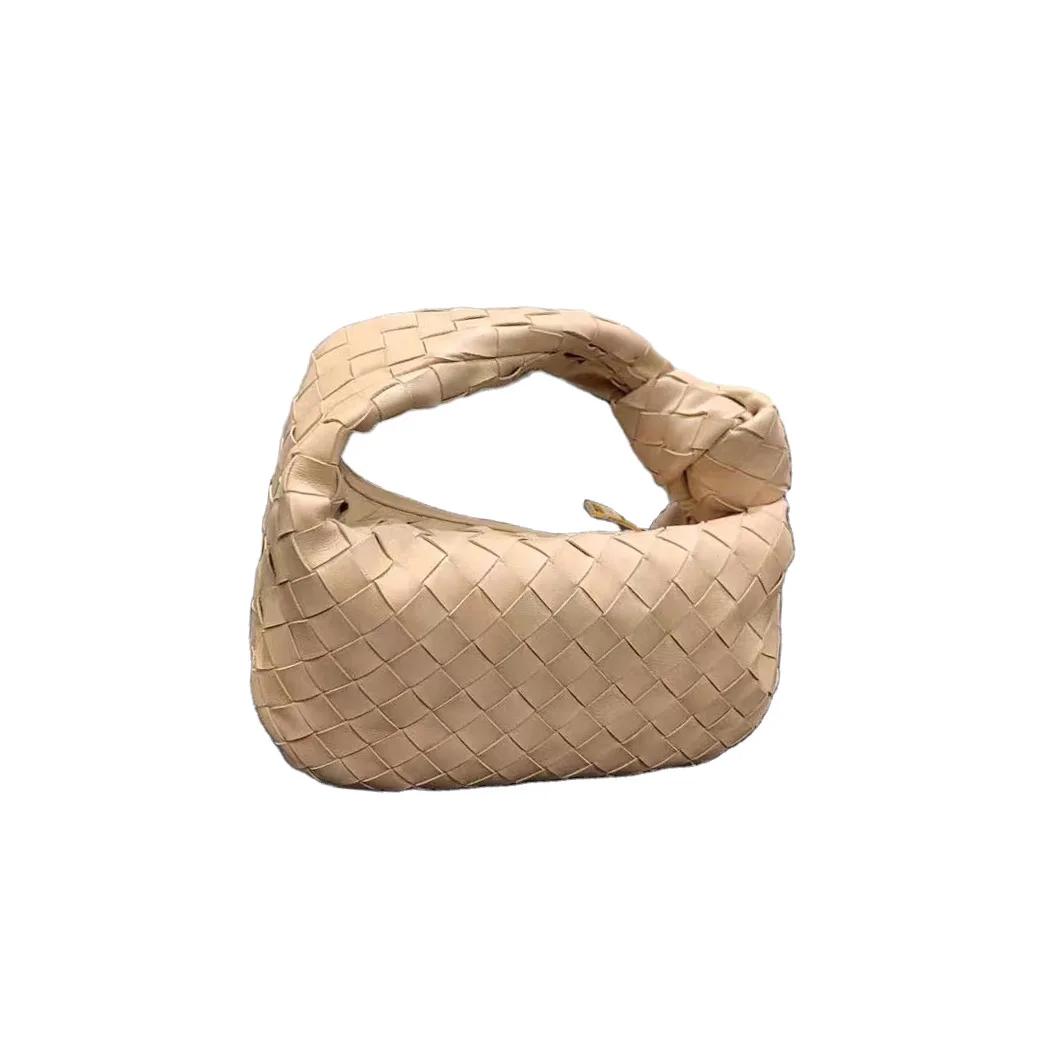 

Spot 2021 soft cowhide woven croissants carrying large bags and large capacity clips pleated jiaozi bags