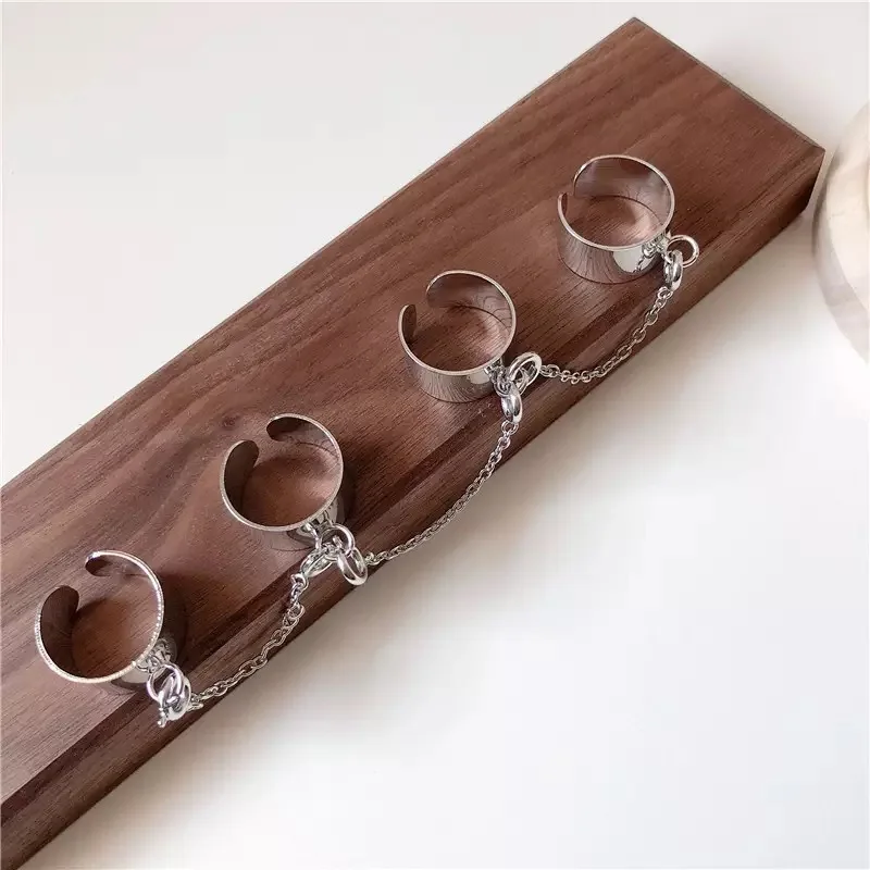 

Multi-layer Punk Cool Hip Pop Adjustable Chain Four Fingers Open Alloy Women Rotate Rings for Women Party Gift