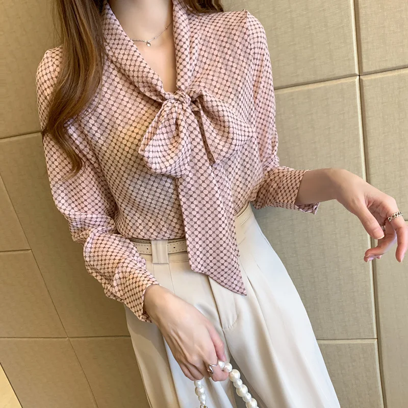 

Women's long-sleeved blouses 2021 spring new bow fluttering wide loose and versatile wave point autumn top