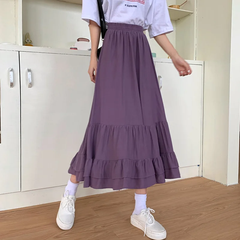 Женская юбка средней длины белая А-силуэта с высокой талией на весну и осень