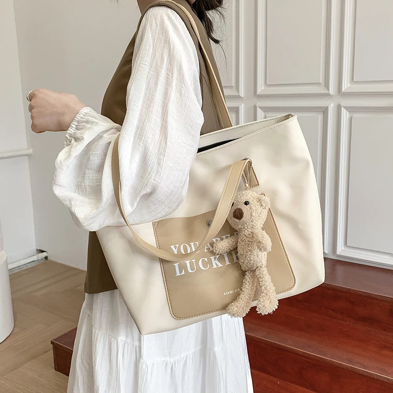 

Large capacity bag women's summer versatile 2021 New Fashion College Students' class single shoulder bag simple Tote Bag