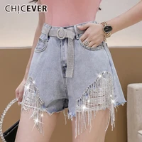 chicever rivet hole denim shorts for women high waist sashes patchwork tassel loose trousers female summer fashion new 2021 tide