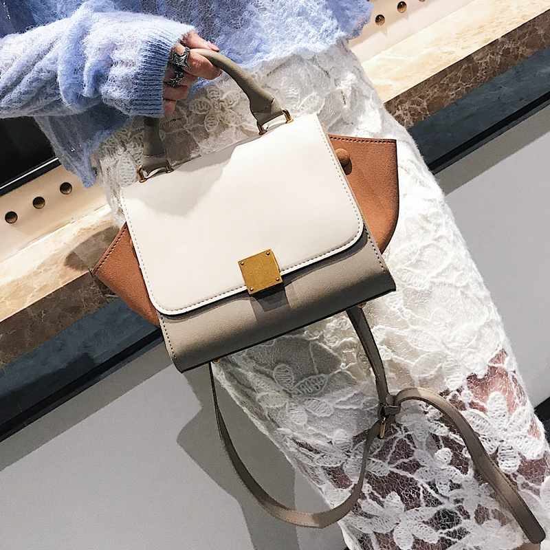 

Color contrast portable shoulder bag 2020 summer new women's bag retro lock wing bag European and American fashion crossbite Bat