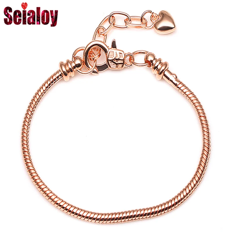 Плотный браслет Seialoy из розового золота с инкрустацией в форме сердца и змеиная