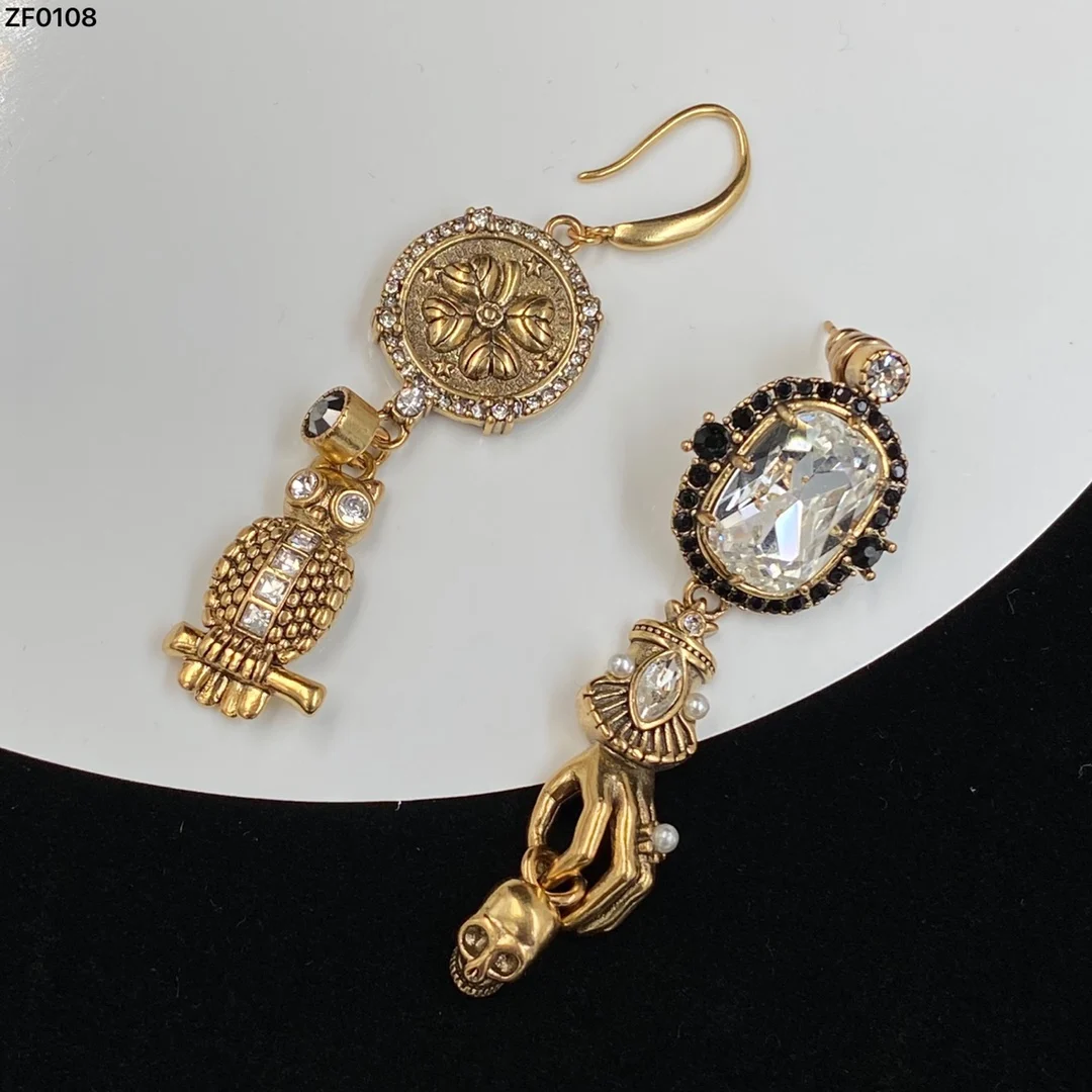 

European and American retro heavy industry punk wind Rhinestone irregular Owl Earrings