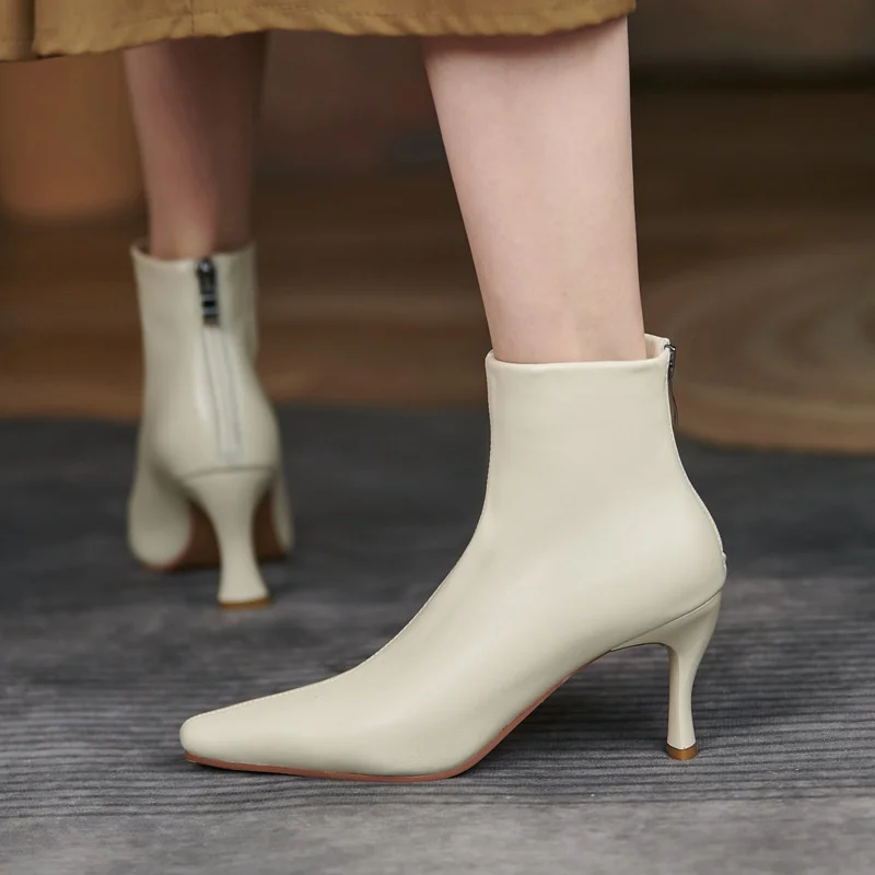 

Soft sheepskin elastic commuter leg wrapped elastic thin boots autumn and winter 2021 new full leather pointed thin heel short