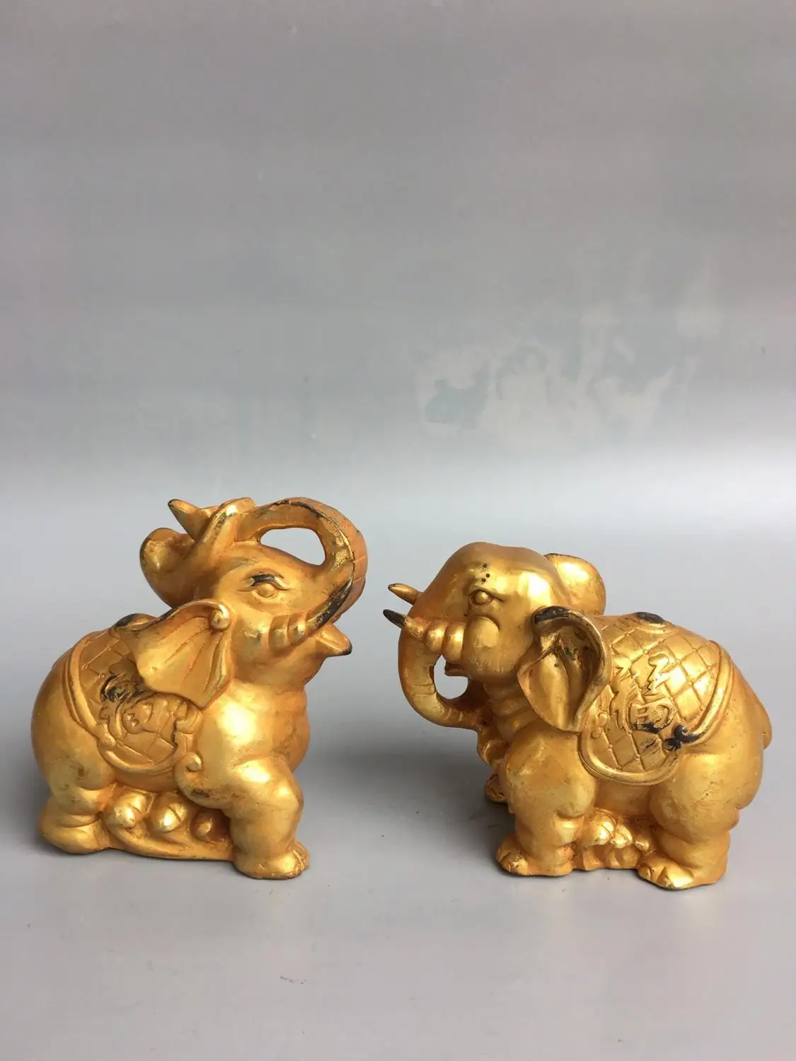 

Wedding Decoration 3" Tibetan Buddhism bronze Gilt gold Elephant statue Carving Fu Elephant A pair It implies peace and image