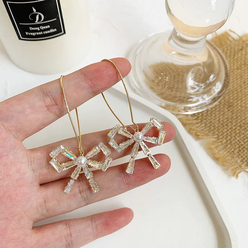 

New Creative Hypoallergenic Ear Hook Temperament Bow Niche Elegant Ladies Fashion Earrings Wholesale Korean Fashion Jewelry