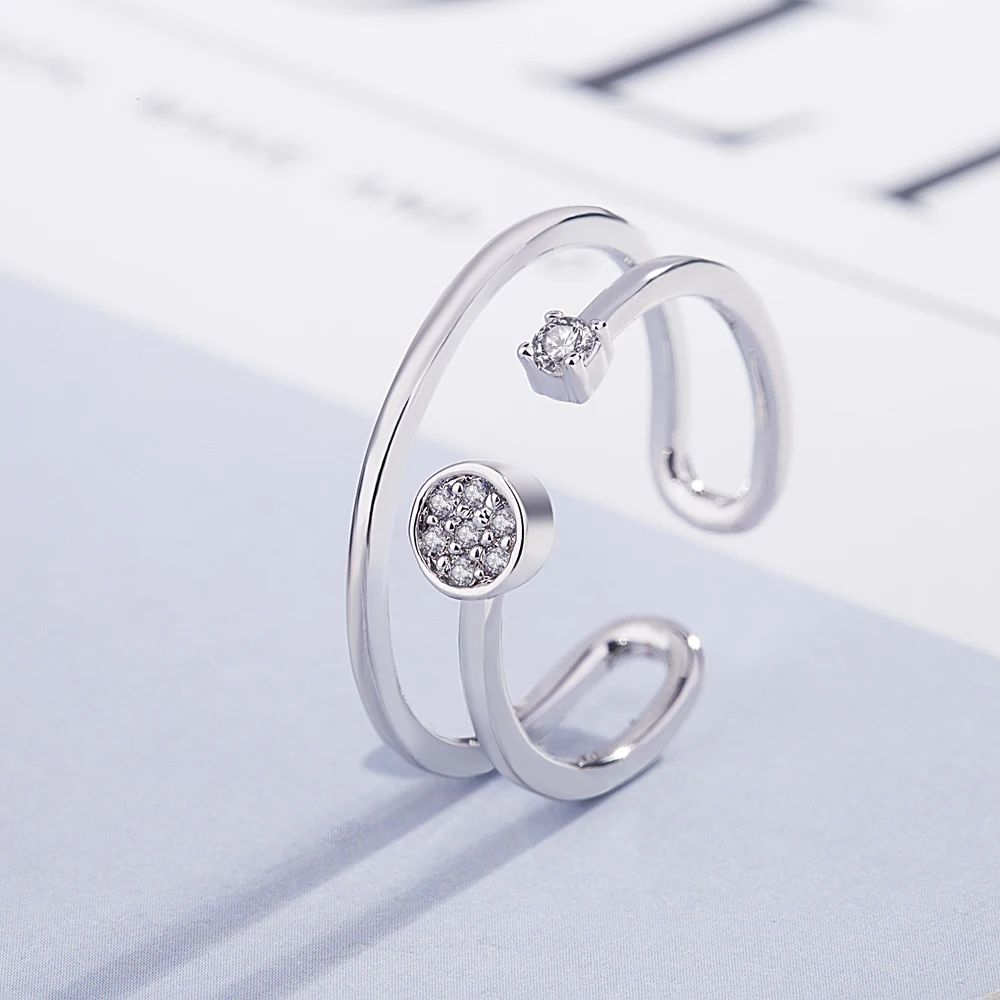 Женское серебряное кольцо с фианитом регулируемое двойным геометрическим