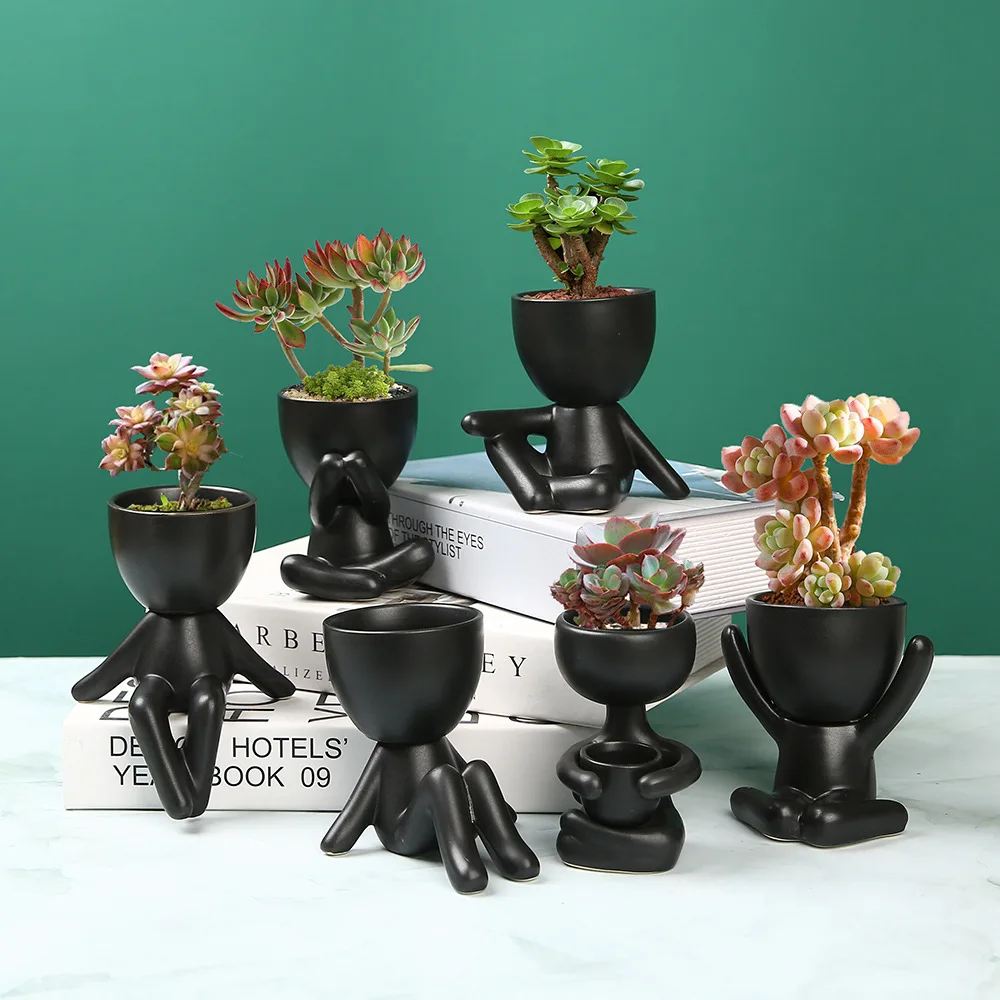 

Nordic succulent plant pots personality creative black ceramic small vase ornaments crafts cute little people potted flower pots