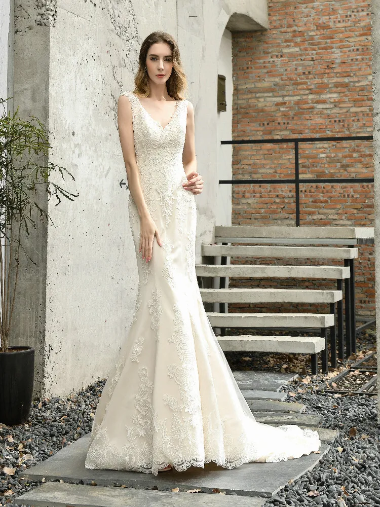 

Sexy Junoesque Mermaid Wedding Dress Lace Applique V-Neck Sleeveless back cutout design High quality Bridal Gown