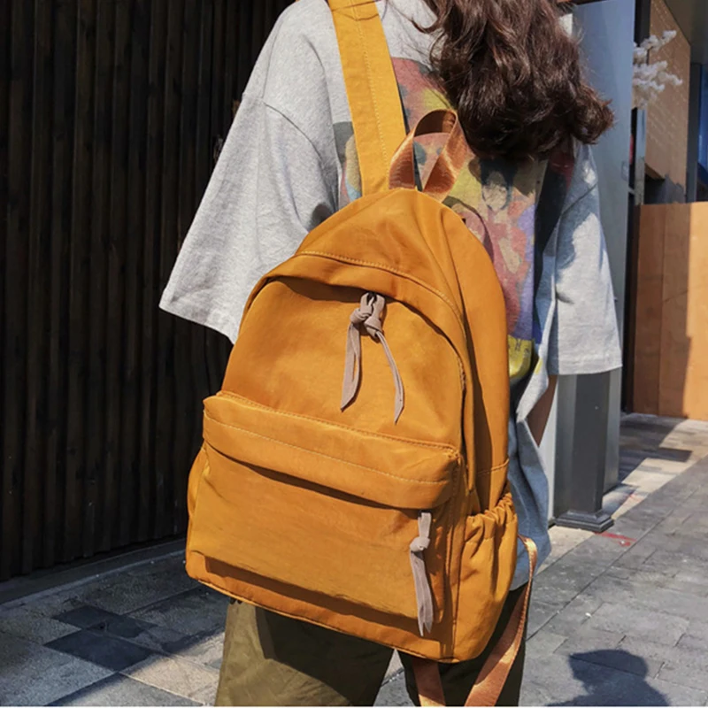 Водонепроницаемый нейлоновый рюкзак бренда atinfor Женский школьный чистого цвета