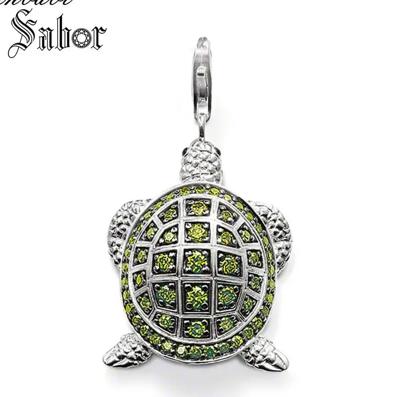 Большой кулон с зеленым кубическим цирконием в форме черепахи серебряного цвета