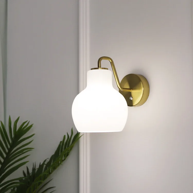

Simple milk white Bauhaus living room wall lamp modern medieval restaurant bedroom bedside Nordic all copper glass lamp