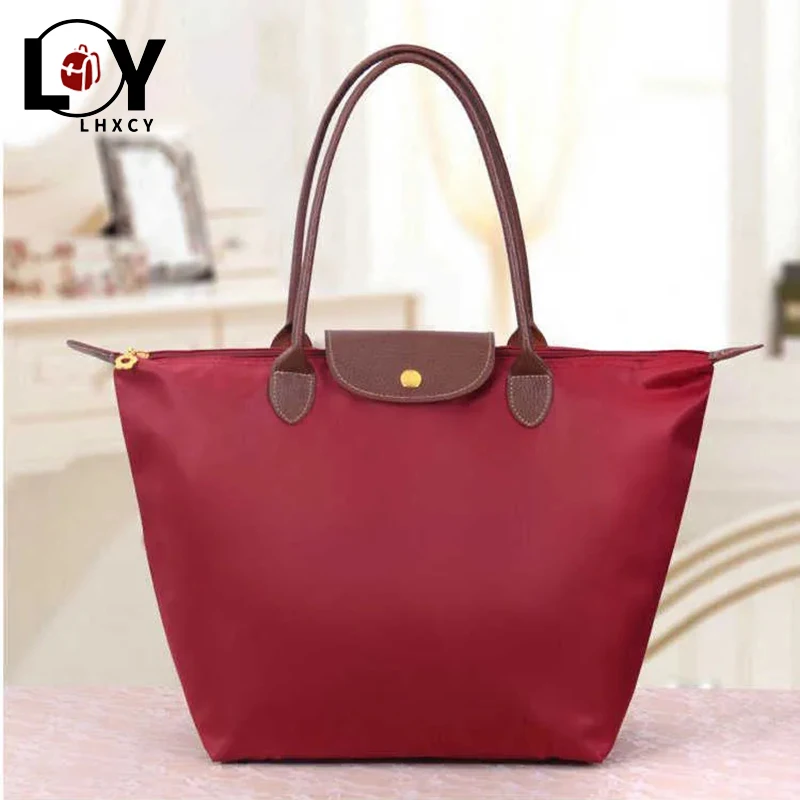 

Famous Brand Lady Bag Shoulder Bag Handbag 2021 Waterproof Nylon Leather Beach Bag Designer Folding Handbag Bolsa Sac Feminina