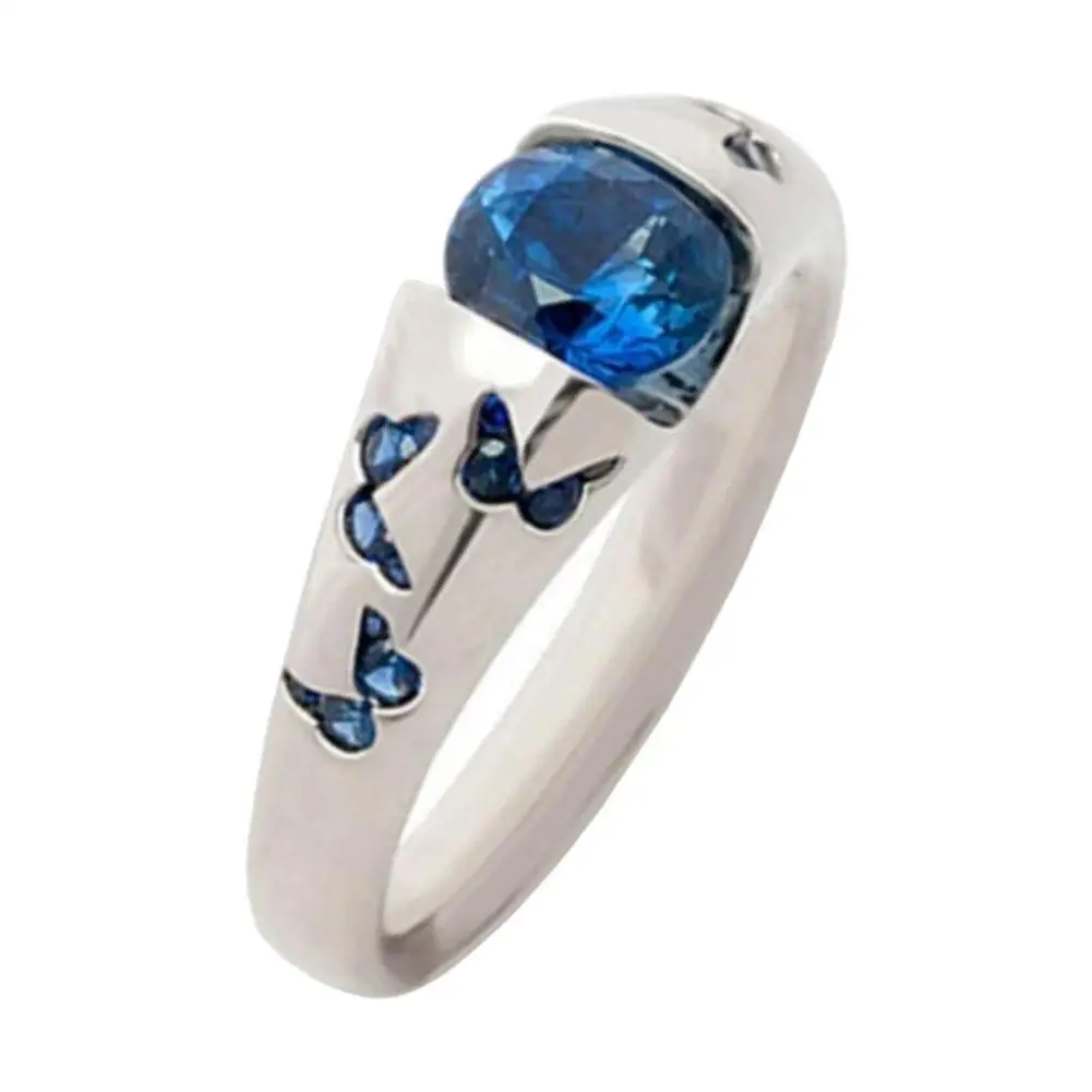 Серебряное кольцо со стразами и драгоценными камнями в виде бабочки с синим