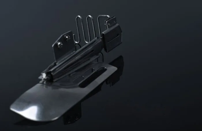 

DAYU 104 K712NA(B) folder TAPE SIZE 1-5/8"---1/2" double wrap hemmer Used for 2 or 3 needle cover stitch machine folder