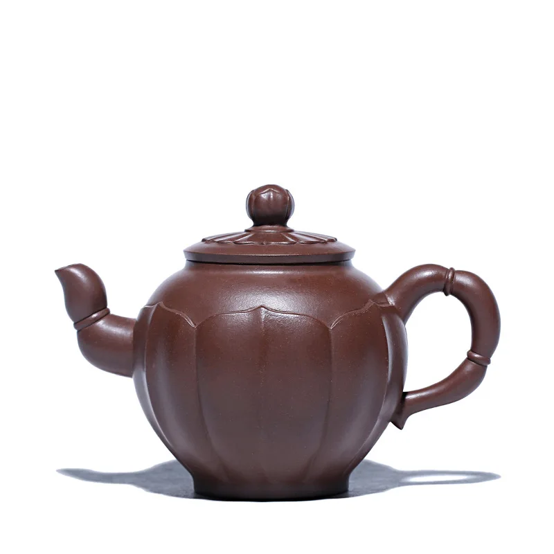 

Yixing purple clay teapot is pure handmade, elegant and elegant