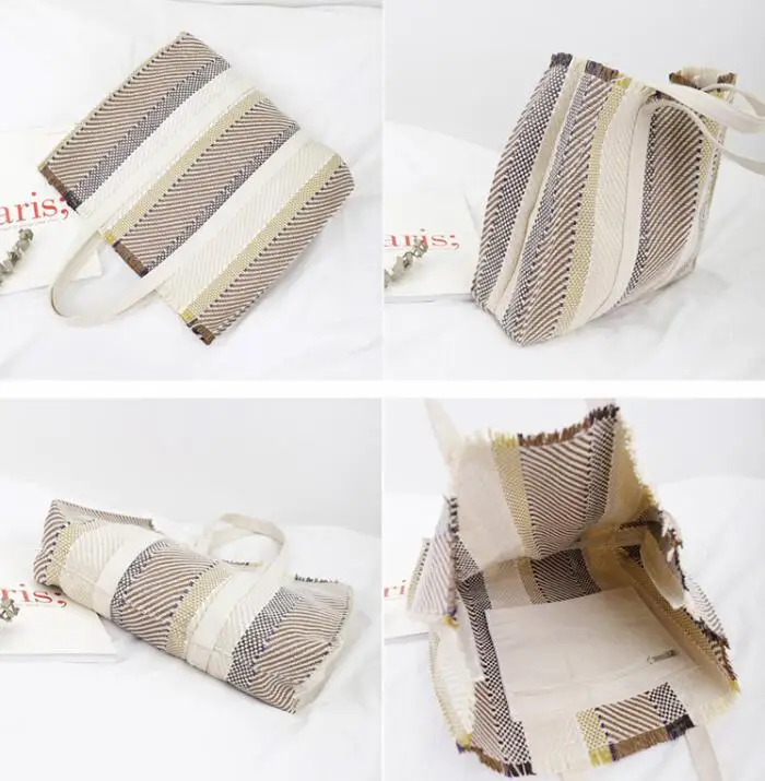 

Korean version of retro woven hand-held bag simple leisure large-capacity handbag ins fashion Joker literary fan women's bag