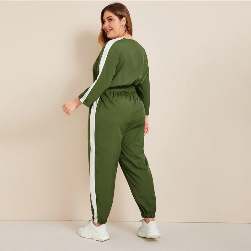 SHEIN плюс размер цветной блок Surplice передний комбинезон с поясом женский весенне-осенний Повседневный v-образный вырез длинный рукав спортивные длинные Комбинезоны