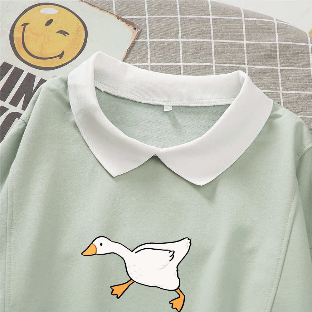 Женская толстовка с капюшоном розовая осенняя оверсайз мультяшным принтом гусей