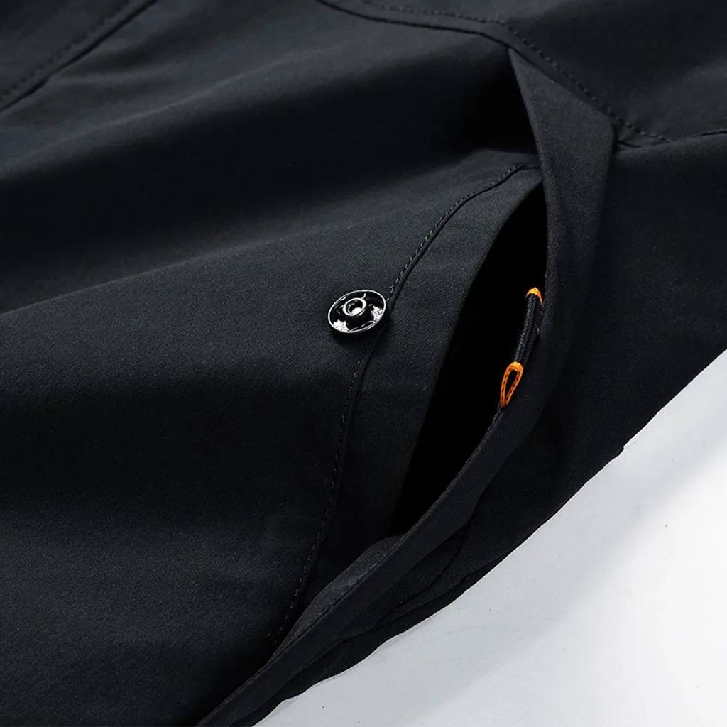 Черная ветровка с пряжкой и лентами карманами капюшоном в стиле хип-хоп на молнии