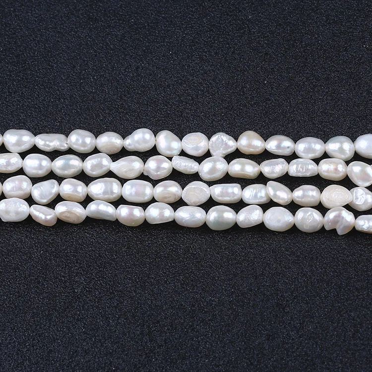 

A grade 5-6mm good quality white pearl strands beads in bulk