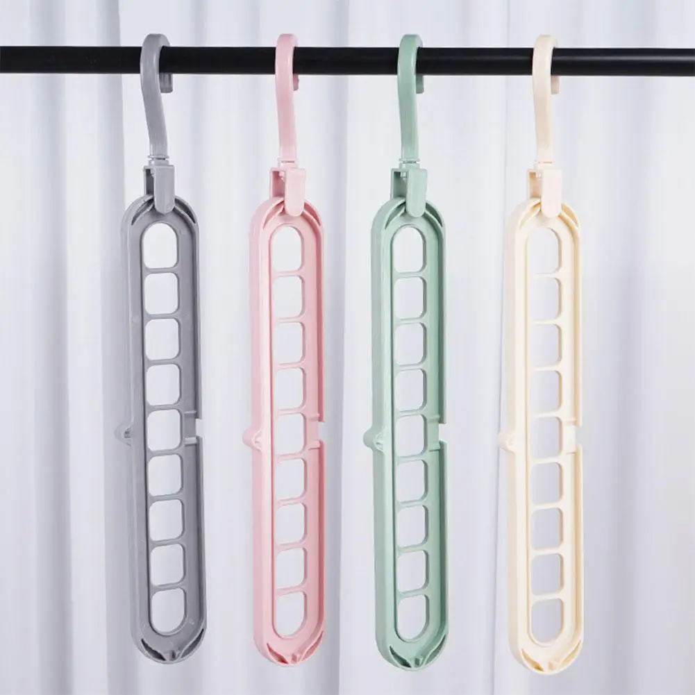 

1Pcs Plastic Multifunctional Hanger Rotating Nine 9-hole Storage Racks Folding Magic Home Dormitory To Clothes And Pants