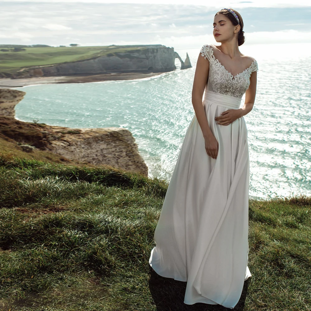 

Платье Свадебное ТРАПЕЦИЕВИДНОЕ с поясом, V-образным вырезом и пуговицами