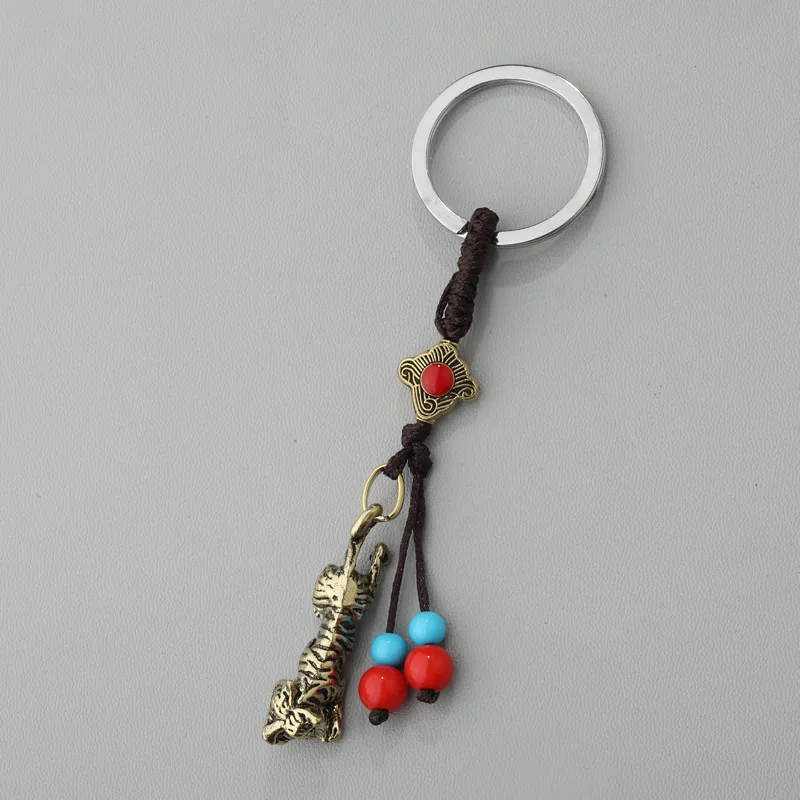 Металлический брелок в виде животных