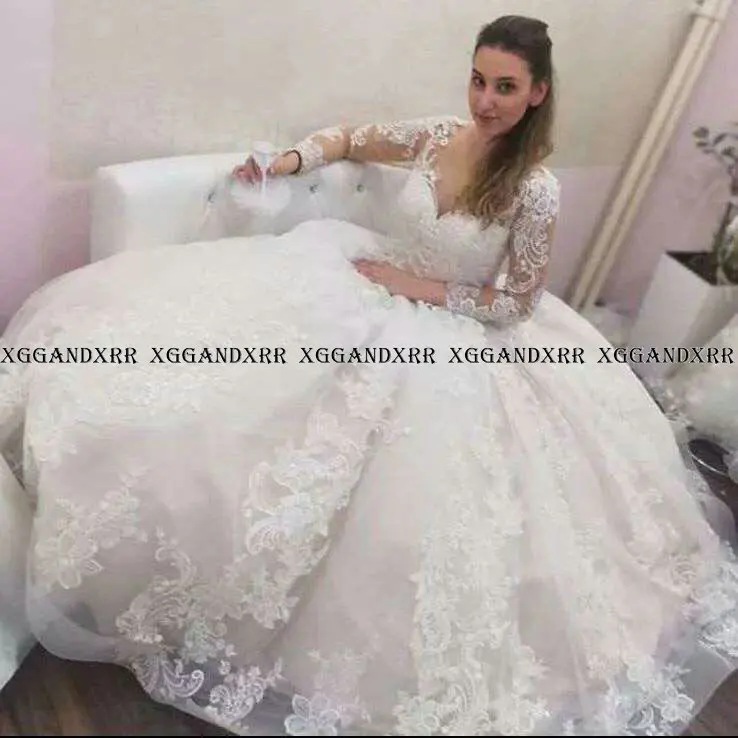 

Luxury A Line Lace Wedding Dresses Elegant O Neck Appliques Illusion Long Sleeves Bridal Gowns Button Plus Size Vestido de Noiva