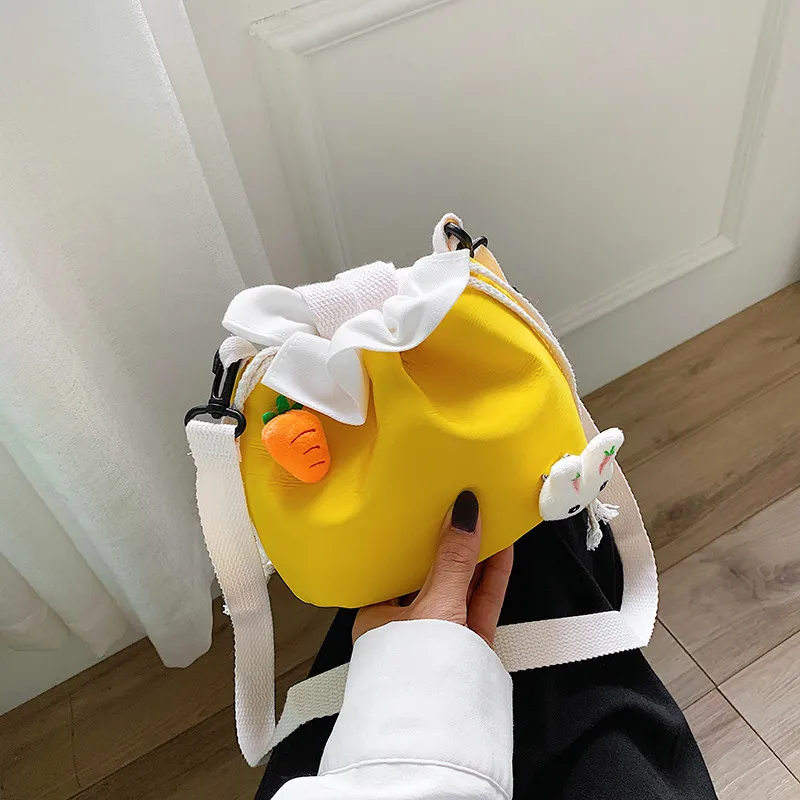 

Small bag female 2020 new trendy Korean fashion cute rabbit pendant texture bucket bag casual shoulder messenger canvas bag