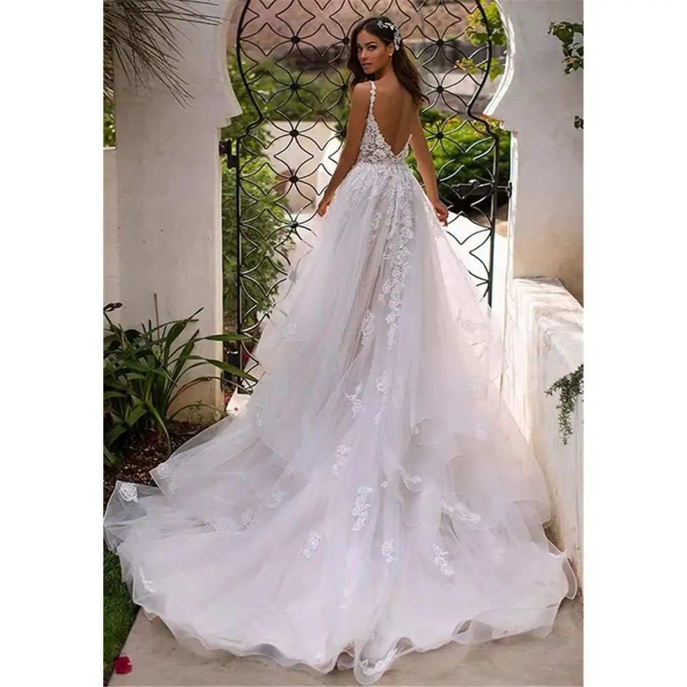 

2021 sleeveless wedding dress 3D pollen face carrying bridal dress princess floor long wedding dress.