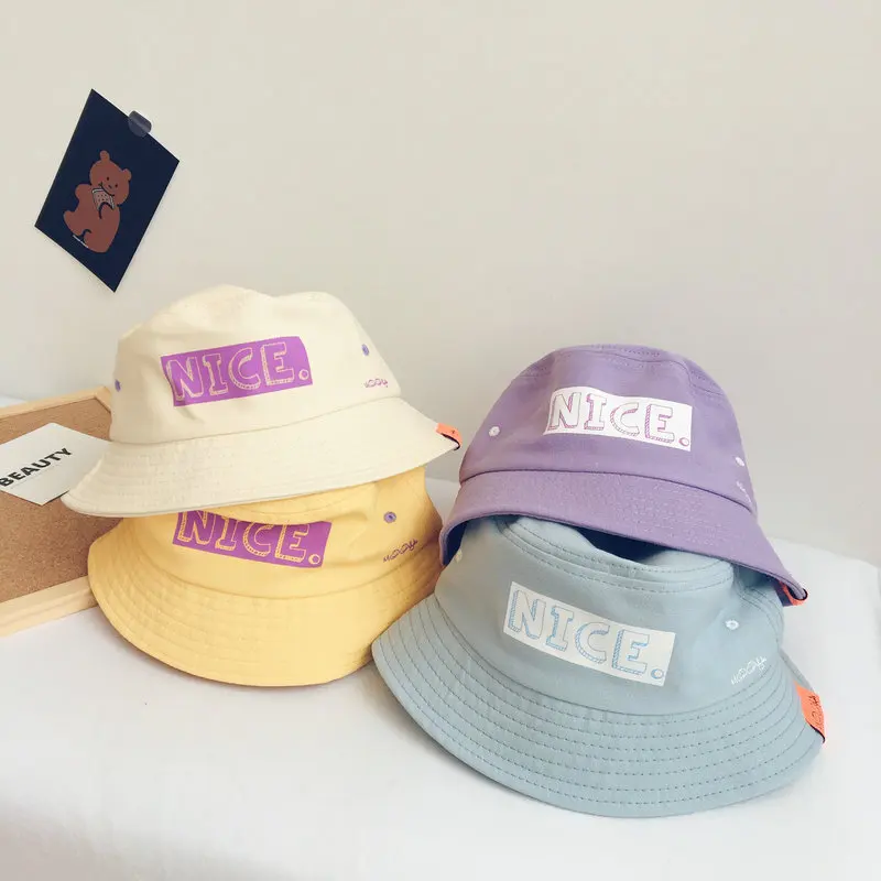 

13 Korean multi-functional baby hat bag dual-purpose letter fisherman hat zipper bag