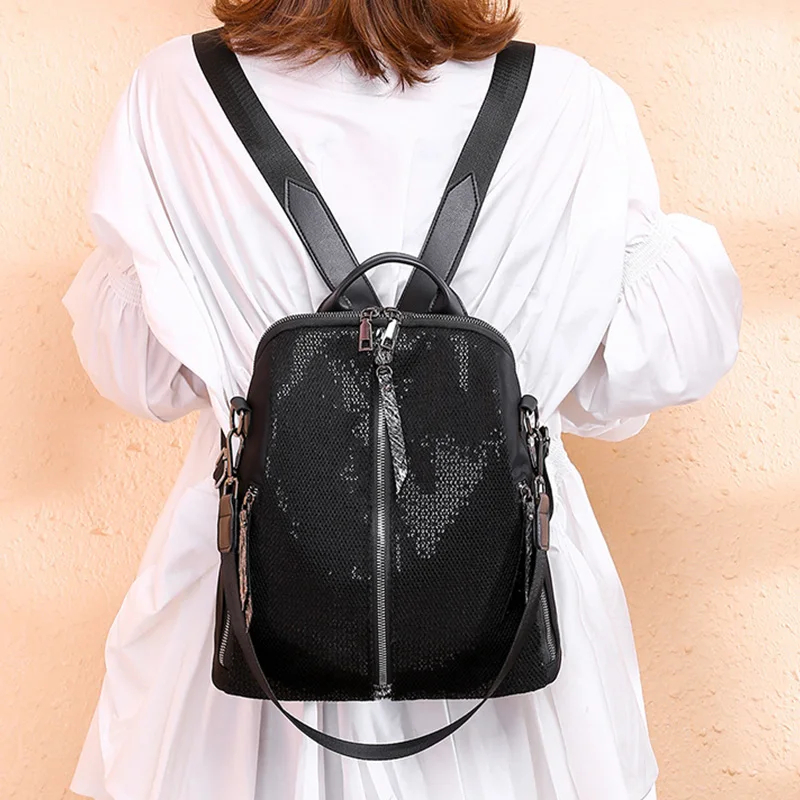 

New Korean Travel Backpack Casual Student Bag Women'S Nylon Waterproof Black Sequin Backpack Female
