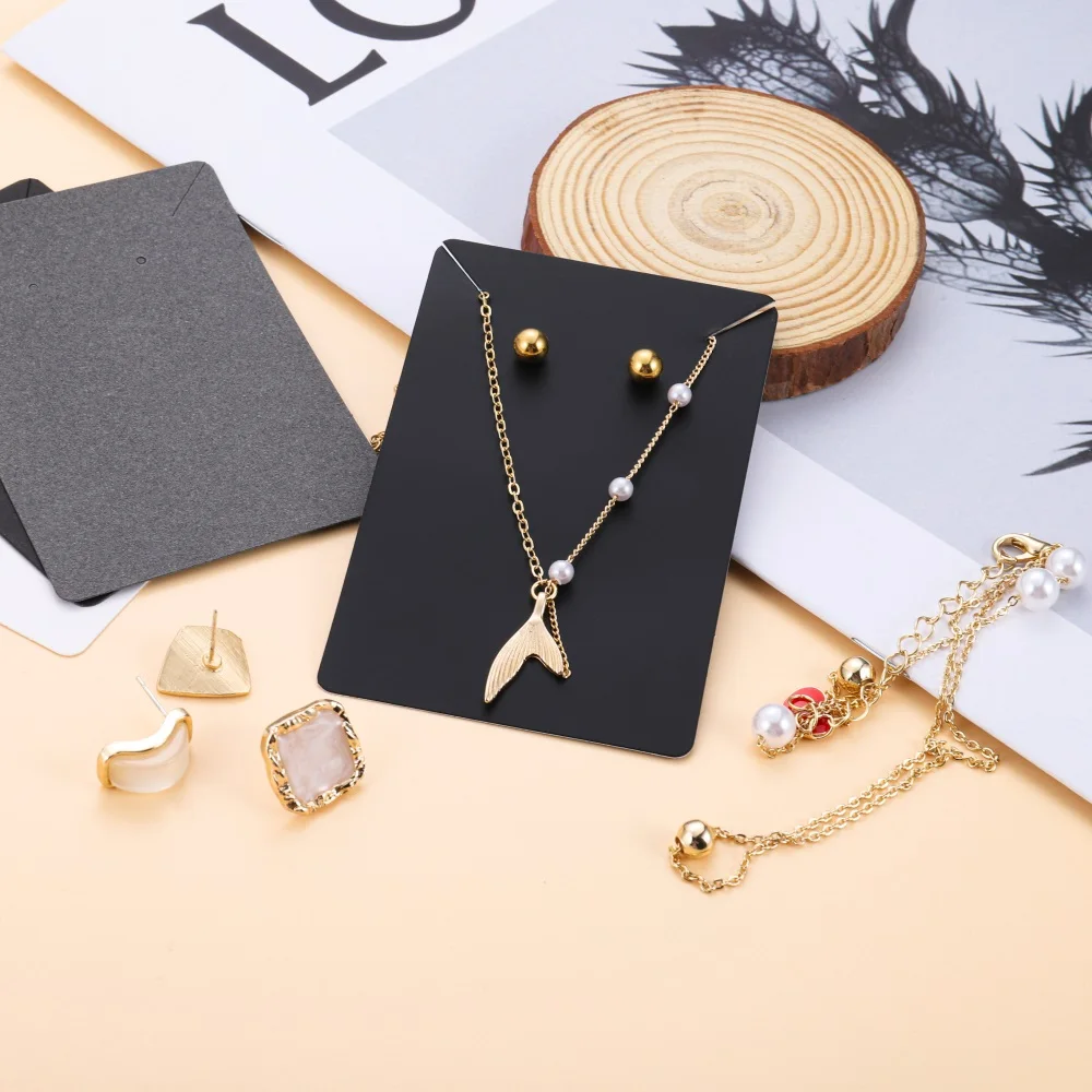 Коричневая картонная подвеска для украшений 6 х9 см 50 шт