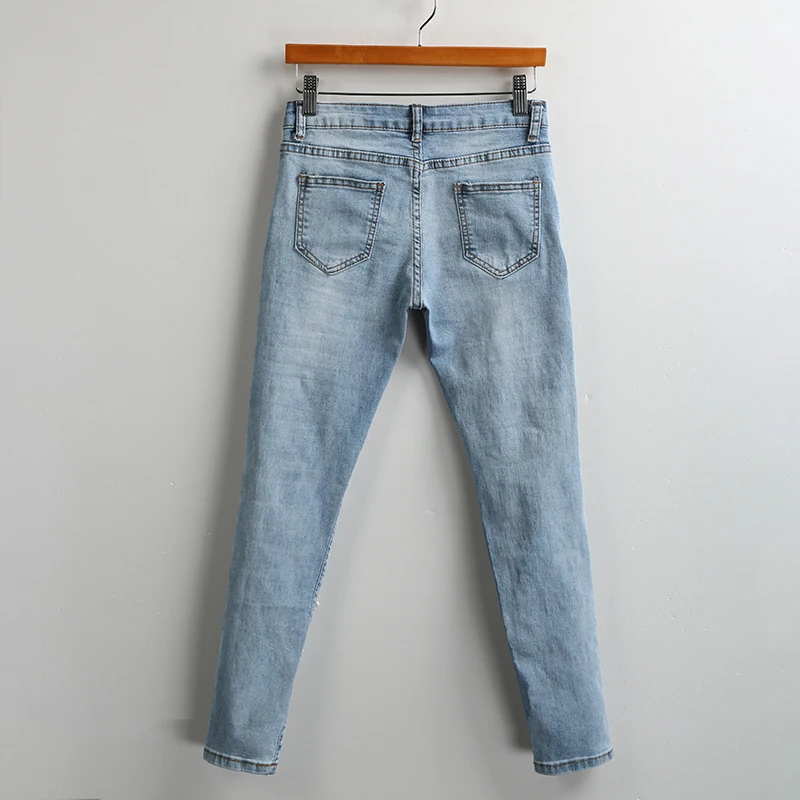 Женские джинсовые брюки с перламутровыми вставками повседневные рваные