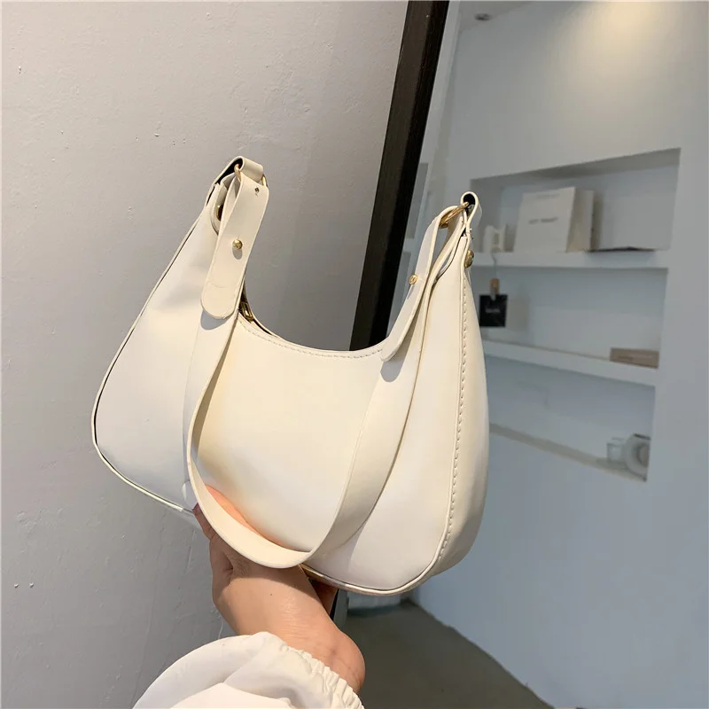 

2021 Luxury Classic Designer Bag PU Leather One-Shoulder Armpit Bag Large-Capacity Portable Women's Essential Makeup Bag