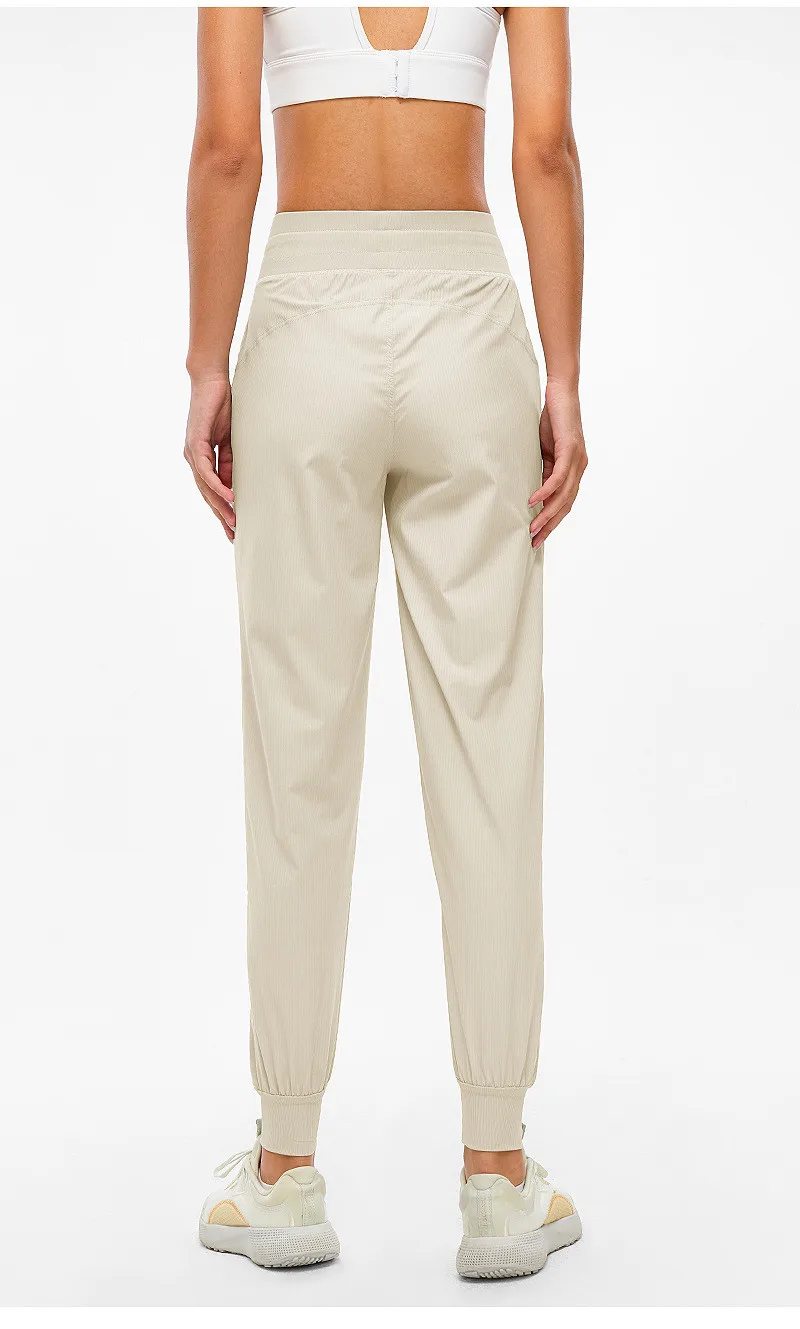 Women Sport Pants Fitness Yoga Legging Natural Folds Quick-drying And Breathable Drawstring Feet Loose Trousers With Pocket