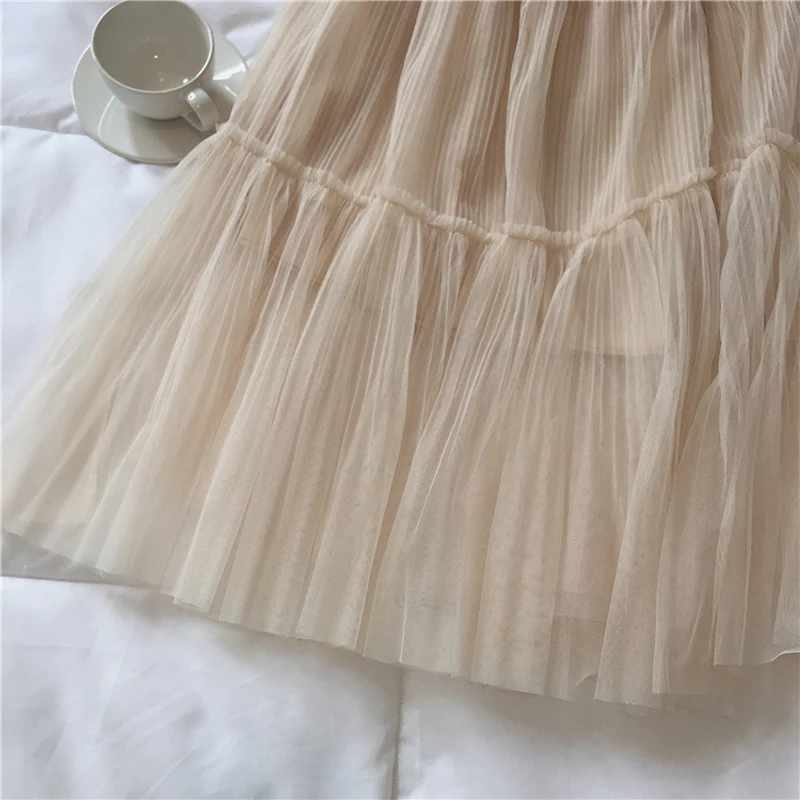 

Spring and autumn women's casual solid color high-waist tulle stitching pleated skirt