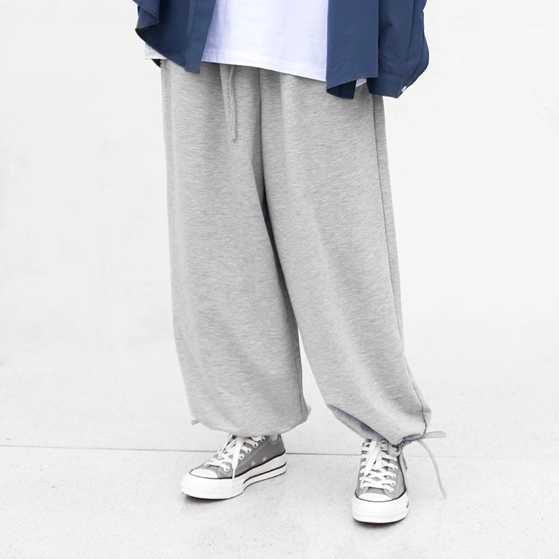 Брюки-шаровары унисекс на шнуровке серые и черные спортивные штаны в стиле