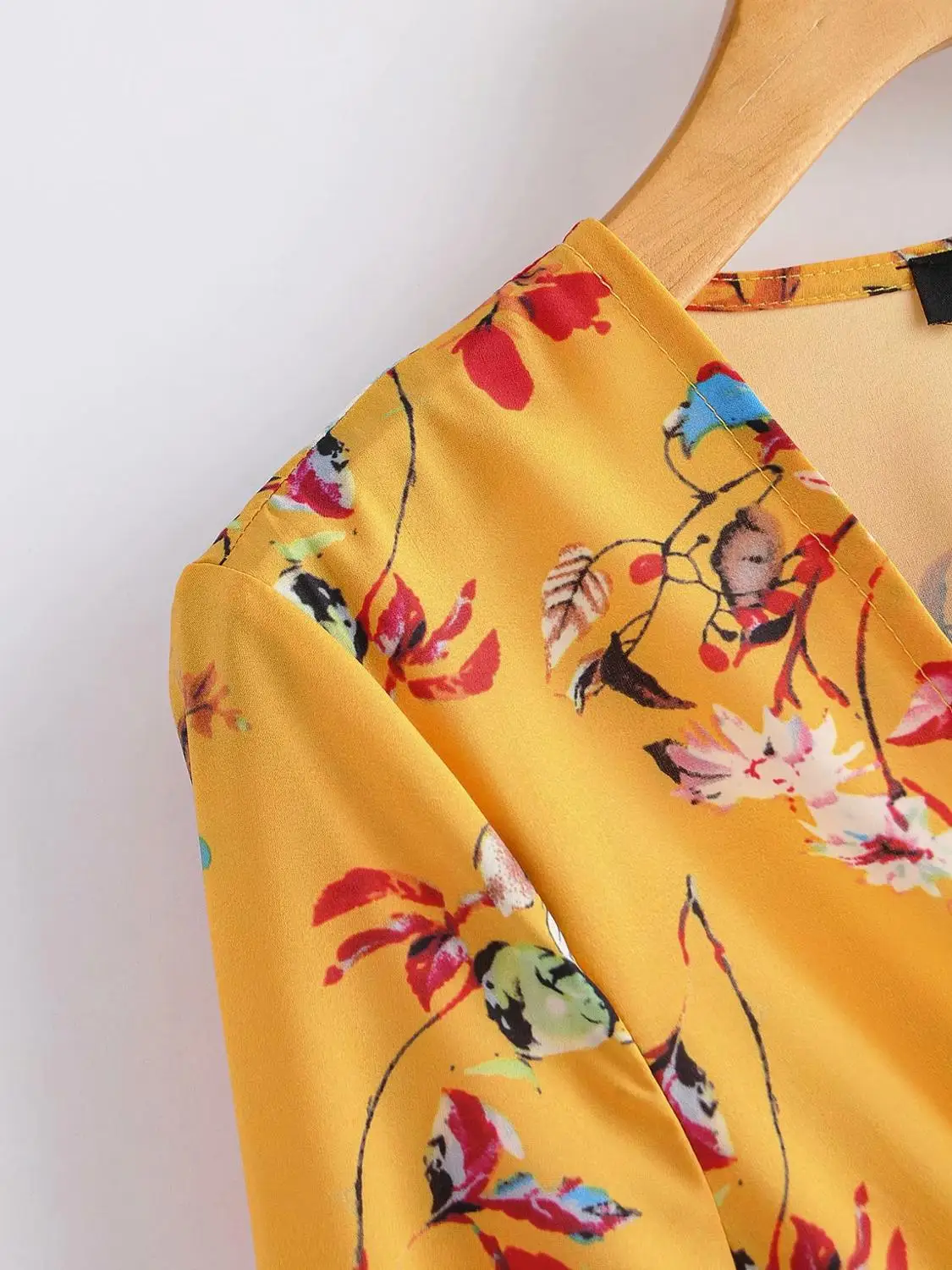 Женский комбинезон с цветочным принтом Bazaleas желтый глубоким v-образным вырезом