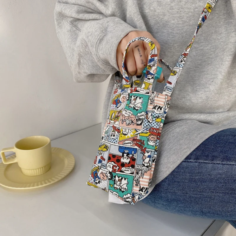 

[Limited time offer] Cute cartoon canvas bag student portable water cup bag milk tea cup cover mobile phone bag coin bag