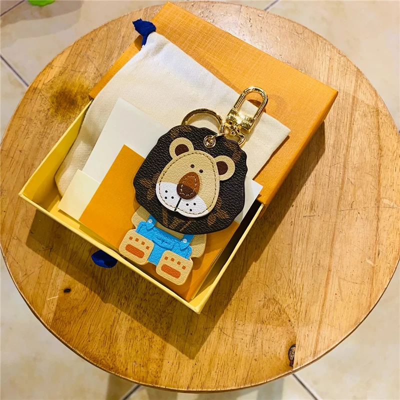 

2021 New High Quality Lion Keychain Acrylic Colourful Christmas Gift Keychains for Car Keys Ring Decoration Accessories